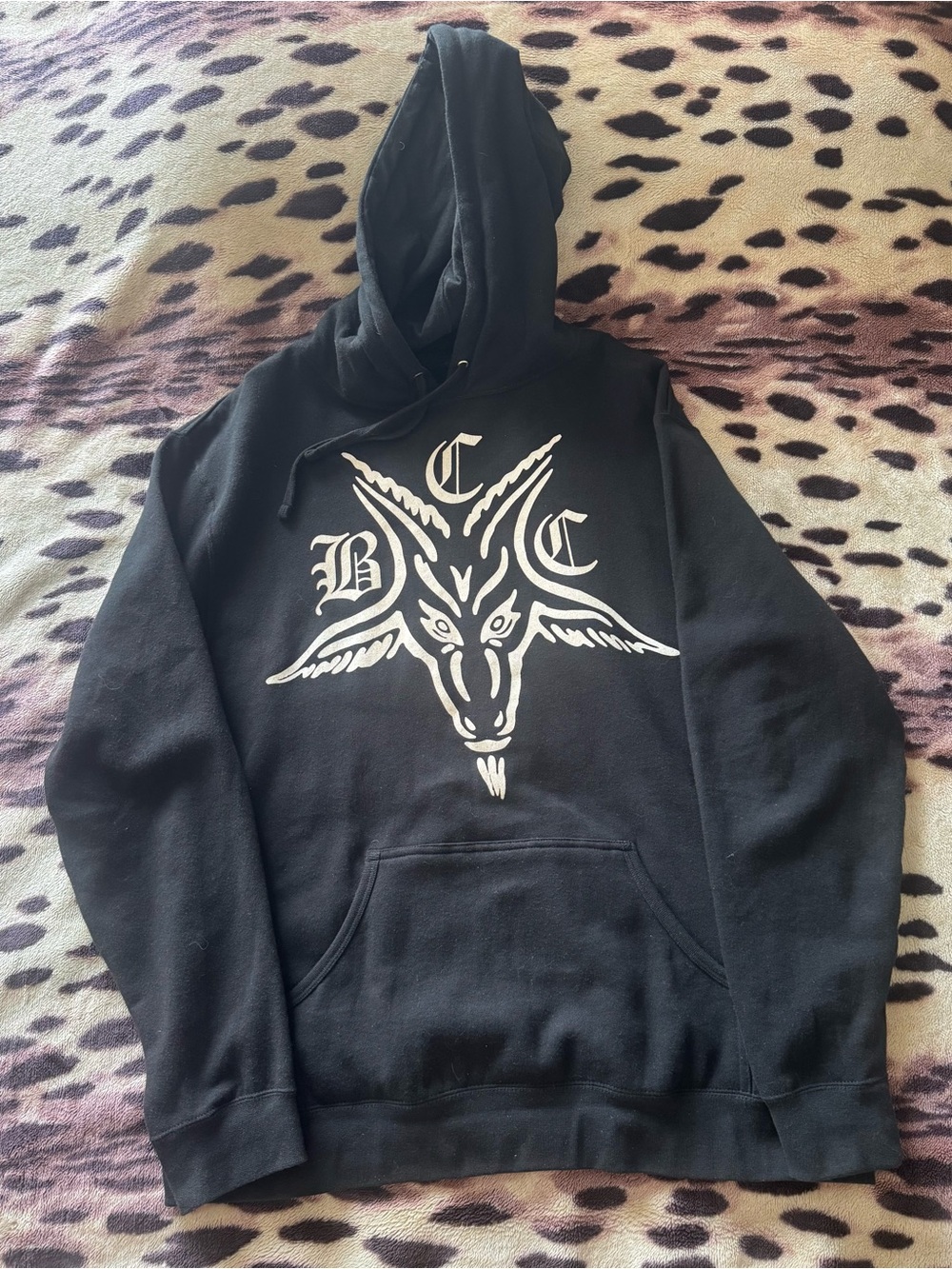 Black Pullover Hoodie with White Goat Head Graphic